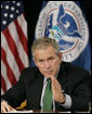 President George W. Bush gestures during a briefing Thursday, Feb. 8, 2007 at the Department of Homeland Security in Washington, D.C., on the status of DHS's priorities, especially those relating to the War on Terror. White House photo by Paul Morse