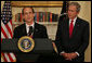 President George W. Bush listens as Steve Preston, the President's nominee for Secretary of Housing and Urban Development, makes remarks during the announcement Friday, April 18, 2008, in the Roosevelt Room of the White House. Acknowledging the President's nomination, Mr. Preston said, "As we help people pursue the American Dream, we need to have a market to operate fairly and effectively for all Americans. And our solutions must restore confidence in our markets, while not erecting barriers to future entrepreneurs, investors and home buyers." White House photo by Shealah Craighead