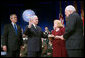 Vice President Dick Cheney swears in Robert Gates as Secretary of Defense at the Pentagon Monday, Dec. 18, 2006. Mr. Gate's wife Becky is pictured holding the Bible during the ceremony. White House photo by Eric Draper