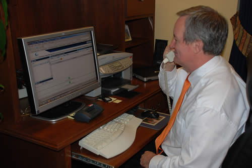 Senator Crapo takes a call during a quarterly iTownHall meeting