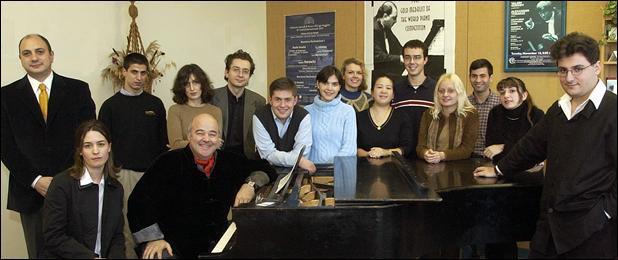 With “Lexo,” seated, center, at the helm, the Toradze Piano Studio tours worldwide, giving marathon performances, but South Bend, providing “quiet and humble atmosphere,” has come to feel like home.
in Ulysses Dove’s Vespers.
			  
—Courtesy of Indiana University South Bend