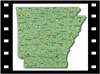 Drawing of outline of the state of Arkansas with county maps showing locations of the Division of Agriculture offices