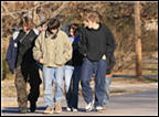 Group of young boys walking along the street