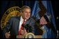 President George W. Bush talks with the employees of National Capital Flag Company in Alexandria. Va., about his Growth and Jobs Package, Thursday, Jan. 9, 2003. "This is a plan to encourage growth, focusing on jobs. And the Council of Economic Advisors has predicted that these proposals will create 2.1 million new jobs over the next three years. That's good for the American people. It's good for our economy, " President Bush said after his tour of the company.  White House photo by Paul Morse