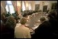 President George W. Bush prays with his Cabinet at the beginning of their meeting May 30. "This a day in which we've removed all the debris from Ground Zero. On behalf of a grateful nation, I want to thank all those who participated in the clean up of that deadly site; and want our nation to continue to offer our prayer to those families and friends and citizens who still hurt as a result of the attacks of September the 11th."  