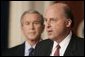 President George W. Bush listens to Ambassador John Negroponte, the Director of National Intelligence nominee, during a press conference held in the Dwight D. Eisenhower Executive Office Building in Washington, D.C., Thursday, Feb. 17, 2005.   White House photo by Paul Morse