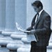 Photo of man reading newspaper in front of columns