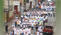 A crowd marching (State Dept.)