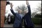 President George W. Bush and Prime Minister Tony Blair wave to onlookers during the President’s visit to the Blair’s home.  White House photo by Eric Draper