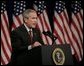 President George W. Bush addresses his remarks on the War on Terror, Thursday, Oct. 6, 2005, speaking before the National Endowment for Democracy at the Ronald Reagan Building and International Trade Center in Washington.  White House photo by Eric Draper