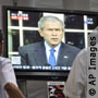 U.S. President George W. Bush announces lifting of N. Korean sanctions on S. Korean television.  (AP Images) 