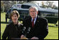 President George W. Bush and Laura Bush extend their condolences to those suffering from the terrorist attacks in Mumbai, India, upon their arrival to the White House Saturday, Nov. 29, 2008, in Washington DC. White House photo by Joyce N. Boghosian