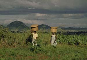 african people with baskets