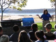 interactive image:  photo - staff teaches importance of Folsom Dam at Beals Point; click for larger photo