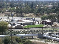 interactive image:  Photo of the American River Water Education Center - Before and After; click for larger photo