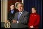 President George W. Bush gives remarks on the economy with members of tax families present in room 450 of the Eisenhower Executive Office Building on February 19, 2004.  White House photo by Paul Morse