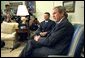 President George W. Bush holds a joint press conference with His King Majesty King Abdullah of the Hashemite Kingdom of Jordan in the Oval Office Thursday, Aug. 1.  