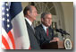 President George W. Bush and French President Jacque Chirac address the media in the Rose Garden Nov. 6. White House photo by Tina Hager.