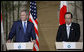 President George W. Bush and Japan's Prime Minister Yasuo Fukuda listen to questions from the audience during a joint press availability Sunday, July 6, 2008, at the Windsor Hotel Toya Resort and Spa. Japan is host to this year's 2008 Group of Eight Summit.  White House photo by Eric Draper