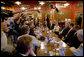 President George W. Bush talks with members of the media during his breakfast meeting with community leaders at the Corner Cafe in Riverside, Mo., Wednesday, Aug. 22, 2007. White House photo by Chris Greenberg