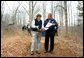 President George W. Bush looks over maps of the Wells National Estuarine Research Reserve with Manager Paul Dest in Wells, Maine, Thursday, April 22, 2004.  White House photo by Eric Draper