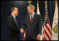 President George W. Bush congratulates Secretary of Housing and Urban Development Steve Preston, Friday, June 6, 2008, following the secretary's ceremonial swearing-in at the Department of Housing and Urban Development in Washington, D.C. White House photo by Joyce N. Boghosian