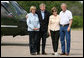 President George W. Bush and Mrs. Laura Bush stand with NATO Secretary-General Jaap de Hoop Scheffer and wife, Jeannine, Sunday, May 20, 2007, after their arrival in Crawford, Texas. White House photo by Shealah Craighead