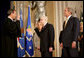 President George W. Bush attends the swearing in of Attorney General Michael Mukasey Wednesday, Nov. 14, 2007, at the U.S. Department of Justice in Washington, D.C. Chief Justice of the United States John Roberts conducted the ceremony."The Attorney General must run the world's largest law firm, and the central agency for enforcement of our federal laws," said President Bush. "He must aggressively prosecute gun criminals and drug dealers, hold corporate wrongdoers to account, protect victims of child abuse and domestic violence, and uphold the civil rights of every American." White House photo by Eric Draper