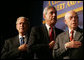 President George W. Bush joins FBI Director Robert Mueller and U.S. Attorney General Michael Mukasey during the playing of the national anthem Thursday, Oct. 30, 2008, at the graduation ceremony for FBI special agents in Quantico, Va. White House photo by Joyce N. Boghosian