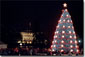 Leading the 2001 Christmas Pageant of Peace program, President George W. Bush and Mrs. Laura Bush preside over the lighting ceremonies for the National Christmas Tree, a 40-foot Colorado blue spruce. White House photo by Susan Sterner.