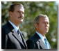 Waving from the White House balcony, President Bush welcomes Mexican President Vicente Fox during the President's First State Visit Sept. 6.