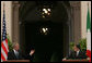 President George W. Bush responds to a reporter's question Saturday, June 9, 2007, during a joint statement with Prime Minister Romano Prodi at his Chigi Palace in Rome.  White House photo by Chris Greenberg