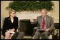 President George W. Bush and U.S. Secretary of Education Margaret Spellings meet with reporters, Wednesday, Oct. 19, 2005 in the Oval Office at the White House to discuss the Nation's Report Card.  White House photo by Eric Draper