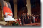 President Bush and church leaders bow their heads in prayer during congressional gold medal ceremony in honor of Cardinal O'Connor Tuesday, July 10, 2001. White House photo by Eric Draper.