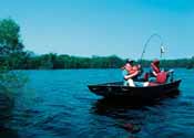 People fishing on a boat.