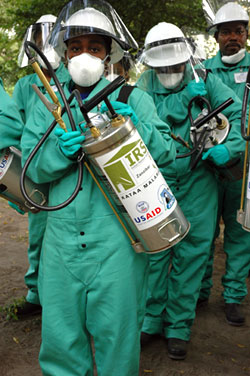 Woman in Zanzibar training for indoor residual spraying