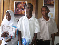 Photo of the three essay contest winners, left to right, Halima, Ismail and Ali.