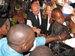 Photo of Rear Adm. Ziemer and Elizabeth McKee Gore, the head of the Nothing But Nets campaign, distribute vitamin A to children at the launch of a national integrated health campaign. (click here to see more)