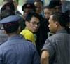 Effective Law Enforcement brings terrorists to trial around the world.  Here, a suspected Abu Sayyaf member enters a courthouse in the Philippines. [AP/WWP]