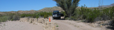 Washouts can occur on backcountry roads following rain storms