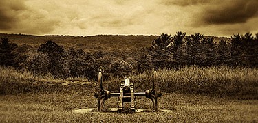 artillery piece overlooking fortifications © MJ Ticcino