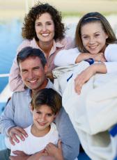 Photograph of a mother, father, son and daughter