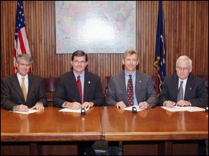 Graphic Arts Coalition renews national Alliance on February 9, 2004. L-R: Ben Cooper, Graphic Arts Technical Foundation/Printing Industries of America, OSHA's then-Assistant Secretary, John Henshaw, Michael Robertson, Specialty Graphic Imaging Association, and Richard H. Dunnington, Gravure Association of America, Inc.