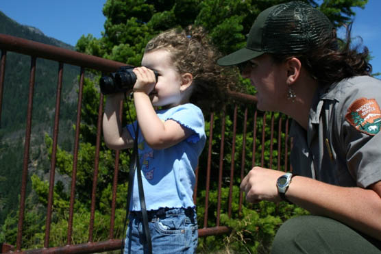 Gwen Peterson shares the view with a young visitor at North Cascades National Park