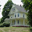 Historic yellow house used by the Herbert Hoover Presidential Library Association.