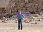 Photo of a man in front of one of the pyramids