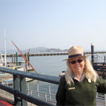 Teacher Michelle Irwin in her National Park Service uniform at work on Hyde Street Pier last summer.