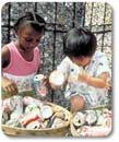 kids recycling cans