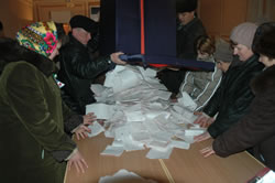 Election officials prepare to count ballots for the Moldovan Parliamentary Election in May 2005