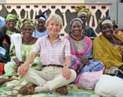 Photo of U.S. Ambassador to Senegal Janice Jacobs and the grandmothers she met with.